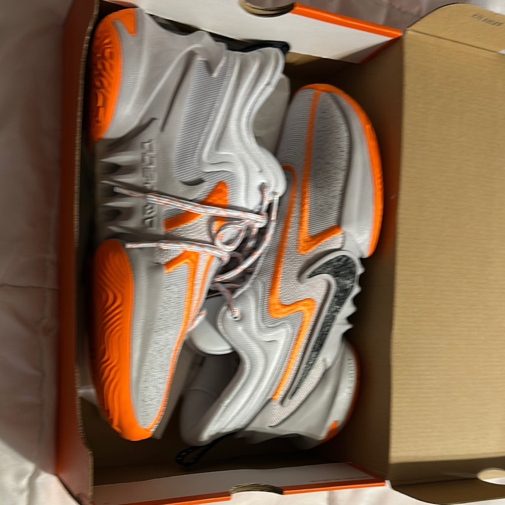 Nike Cosmic 
Basketball shoe